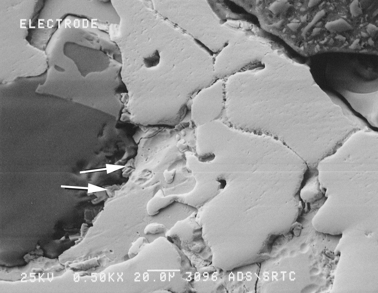 Figure 7. SEM photograph of the molybdenum electrode. EDX spectra indicated the presence of antimony on the surface of the electrode. Nickel from the Inconel sheath was also present.